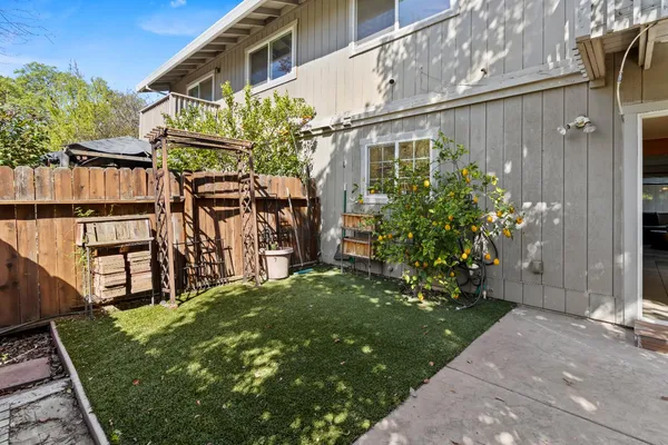 a view of a back yard of the house