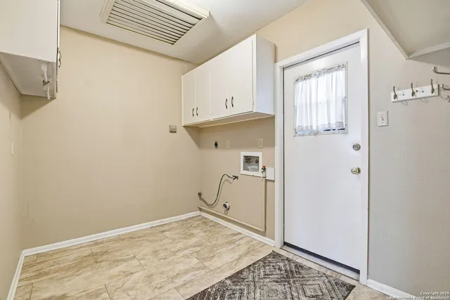 a view of a backyard with wooden floor