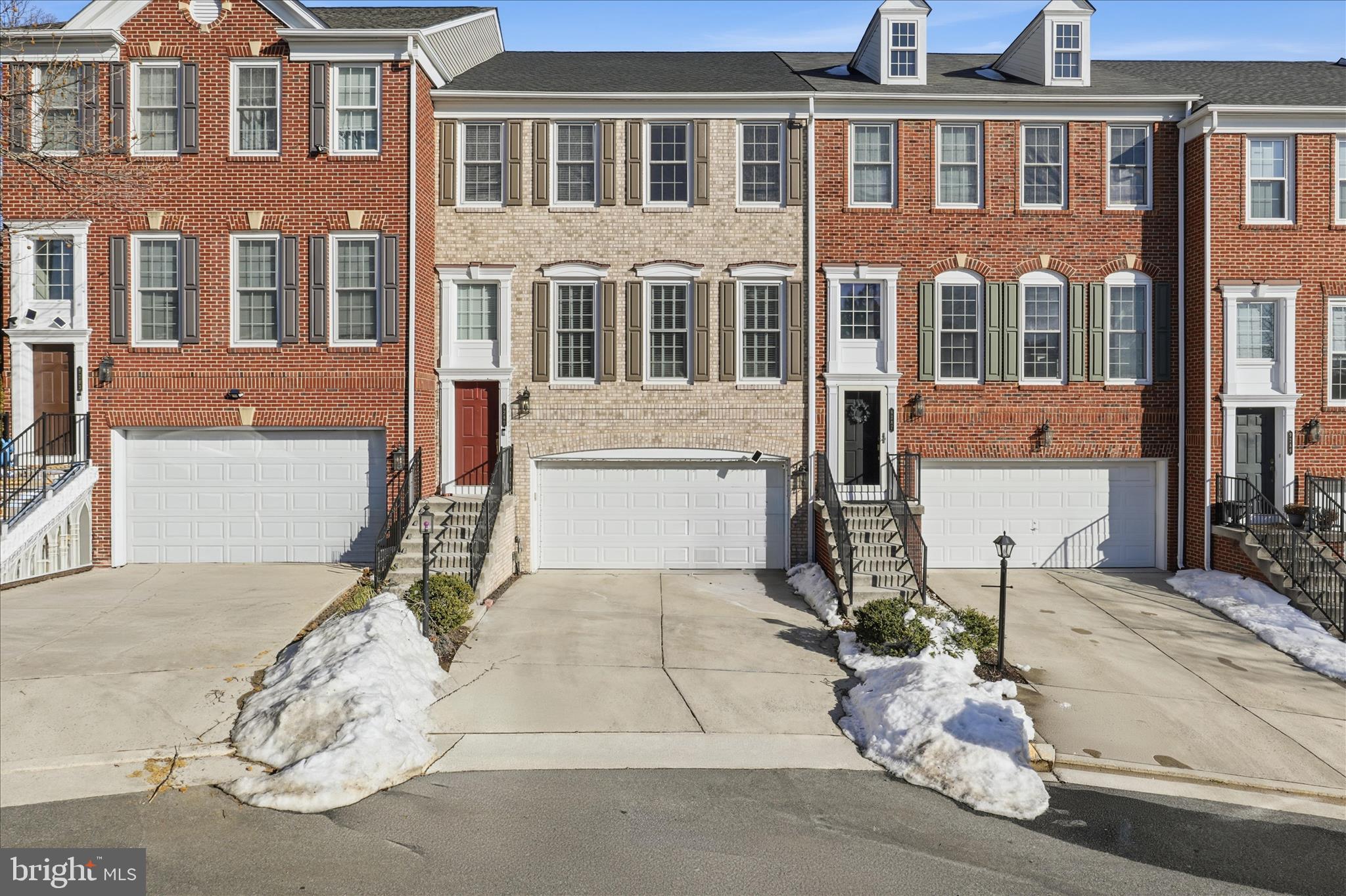 9285 Laurel Ridge Crossing Road Lorton, VA 22079 - Photo 1 of 41 a front view of a building with many windows