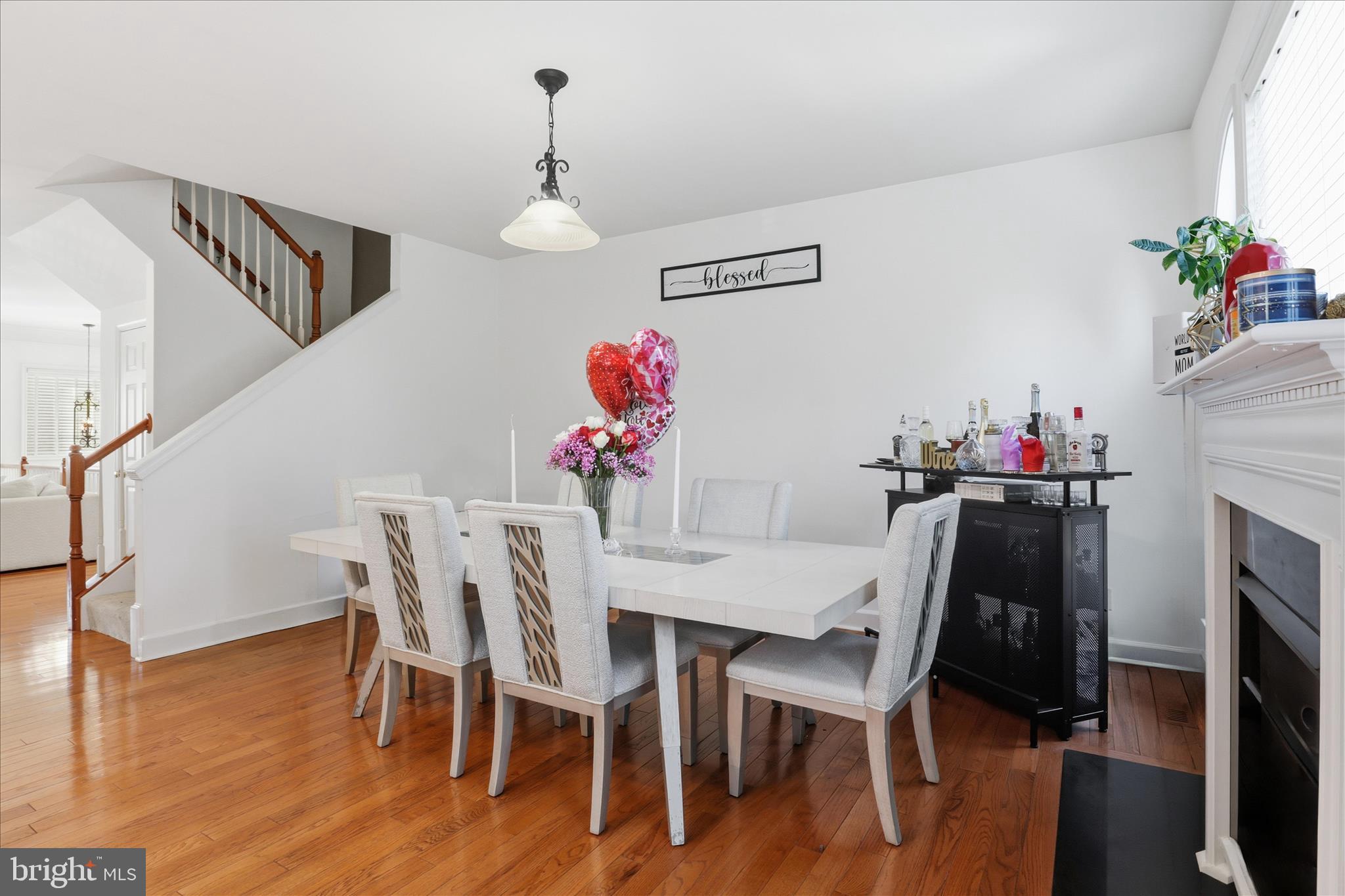 9285 Laurel Ridge Crossing Road Lorton, VA 22079 - Photo 11 of 41 a dining room with furniture and wooden floor
