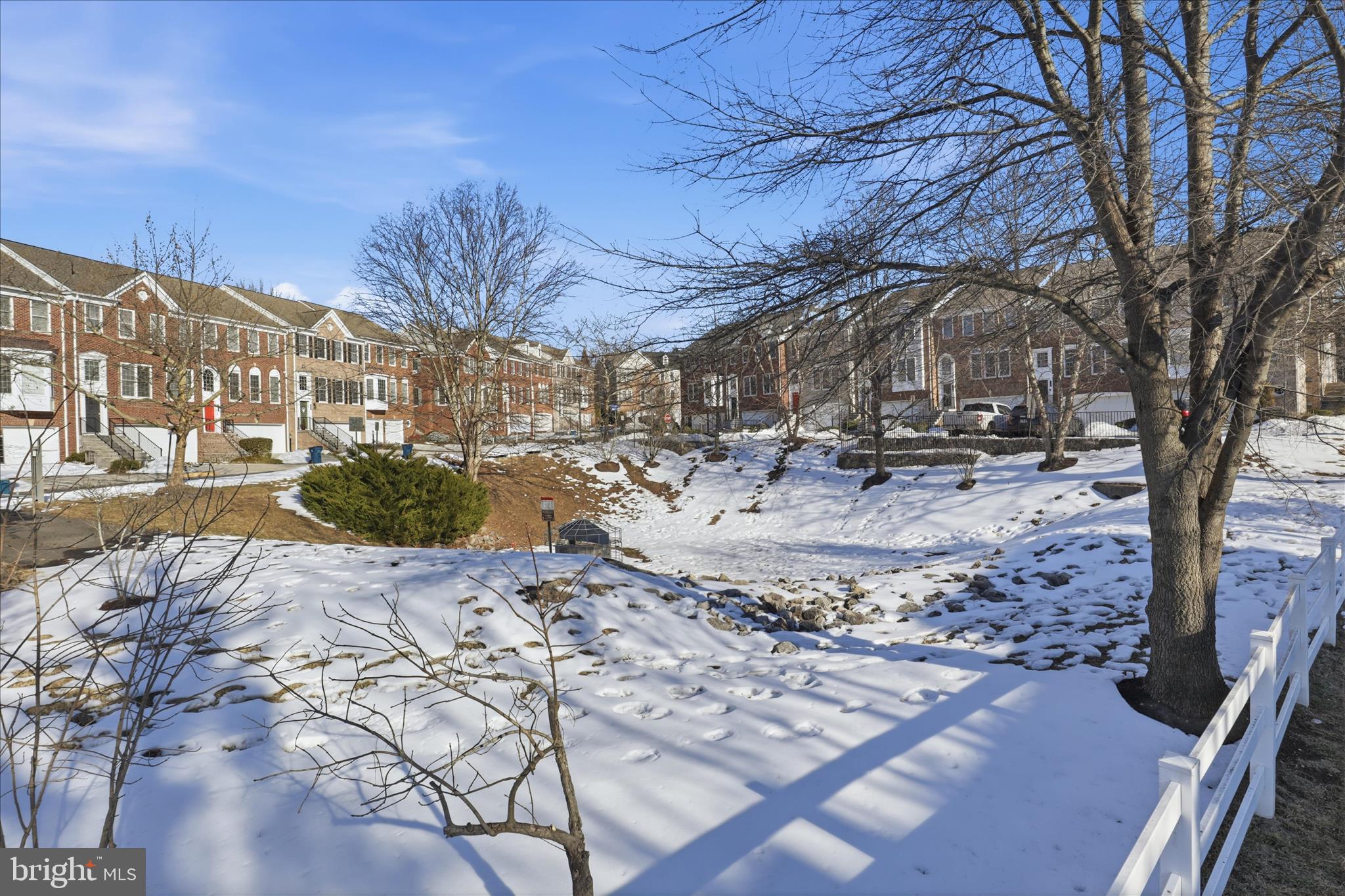 9285 Laurel Ridge Crossing Road Lorton, VA 22079 - Photo 33 of 41 a view of a large building with a yard
