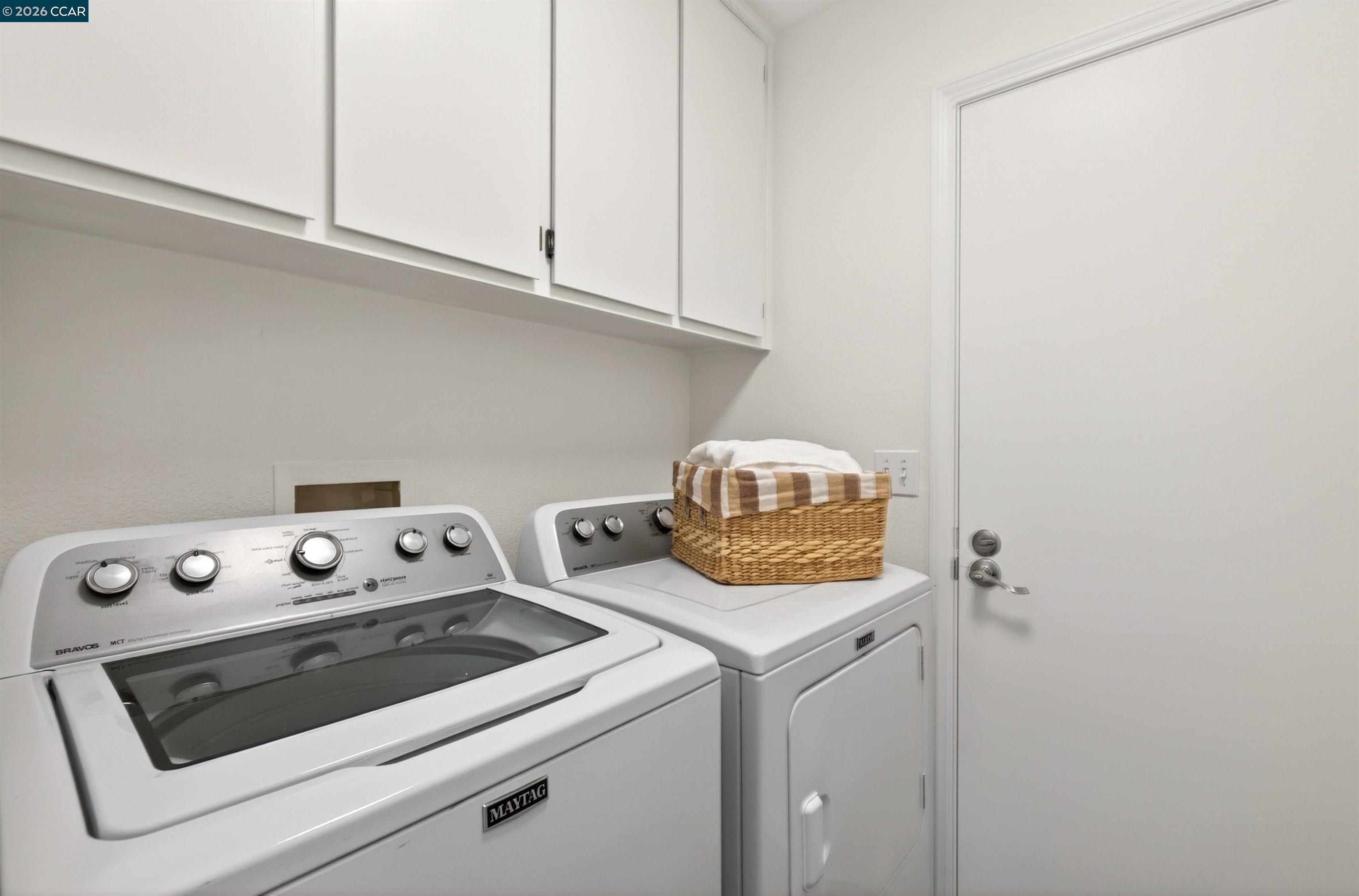 124 Coralflower Lane San Ramon, CA 94582 - Photo 26 of 47 a utility room with dryer and washer