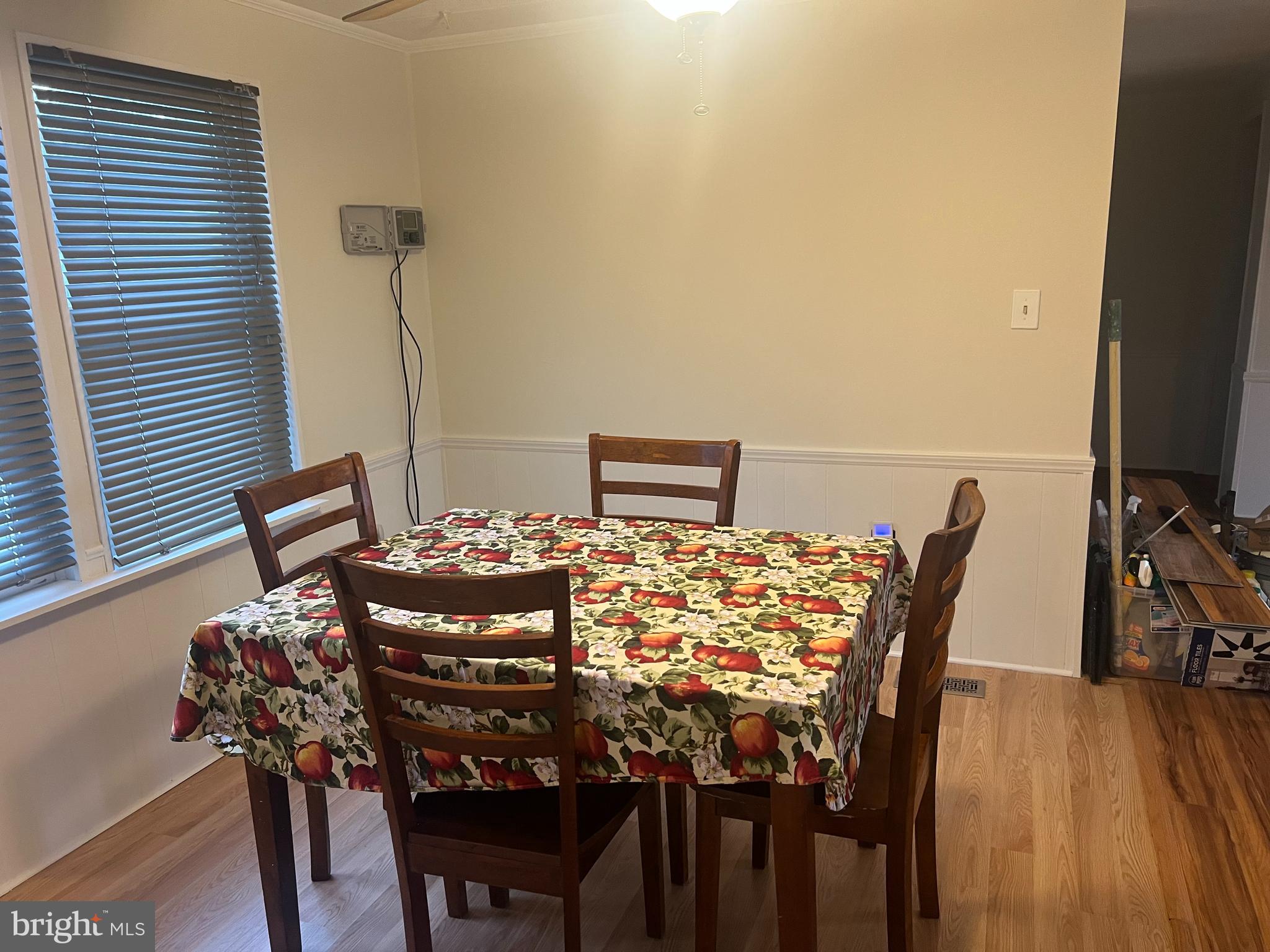 577 Miles Standish Lane Buena, NJ 08310 - Photo 7 of 7 a view of a dining room with furniture and wooden floor