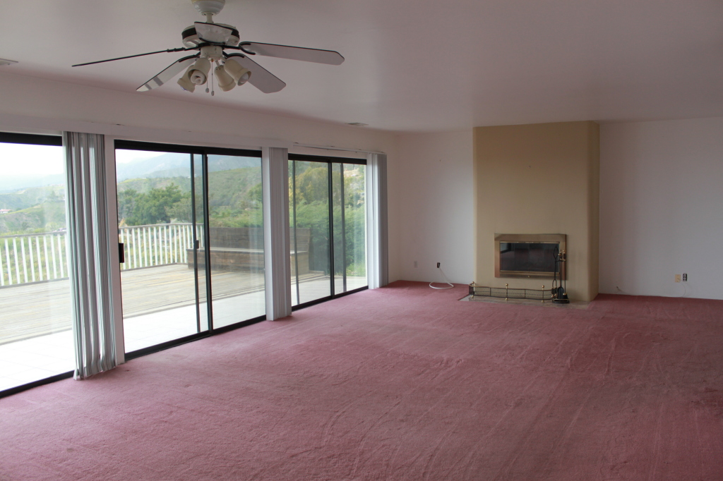1186 Palomino Road Santa Barbara, CA 93105 - Photo 3 of 21 a view of a room with wooden floor and ceiling fan