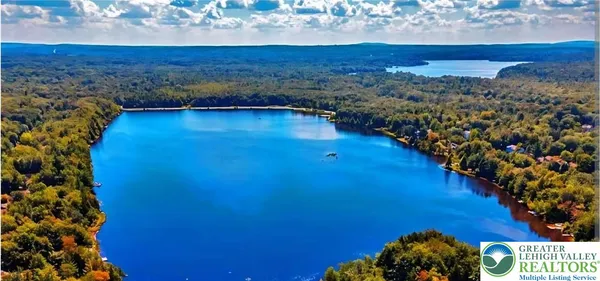 a view of a room with mountain and wooden floor