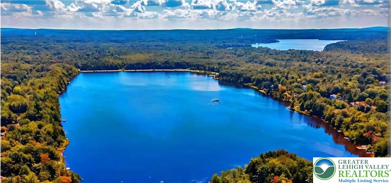 826 Laurel Road Mount Pocono, PA 18344 - Photo 1 of 13 a view of a room with mountain and wooden floor