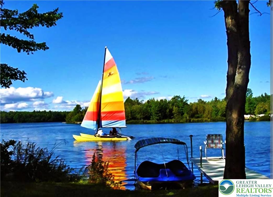 826 Laurel Road Mount Pocono, PA 18344 - Photo 2 of 13 a view of swimming pool with a yard