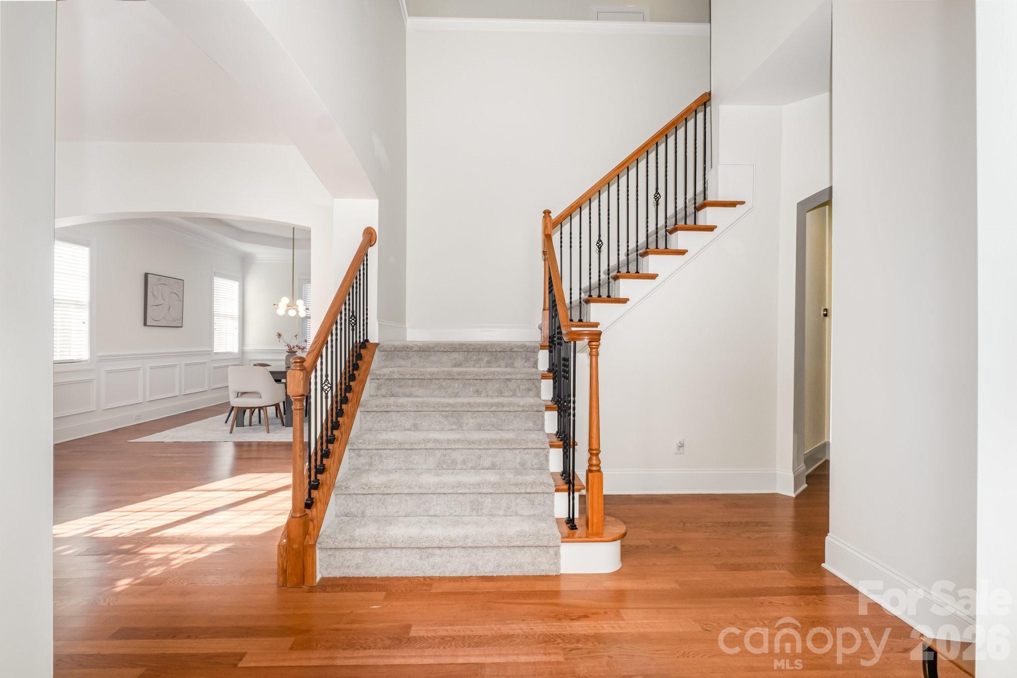 5019 Mesa Verde Road Charlotte, NC 28277 - Photo 19 of 40 a view of entryway and hall with wooden floor