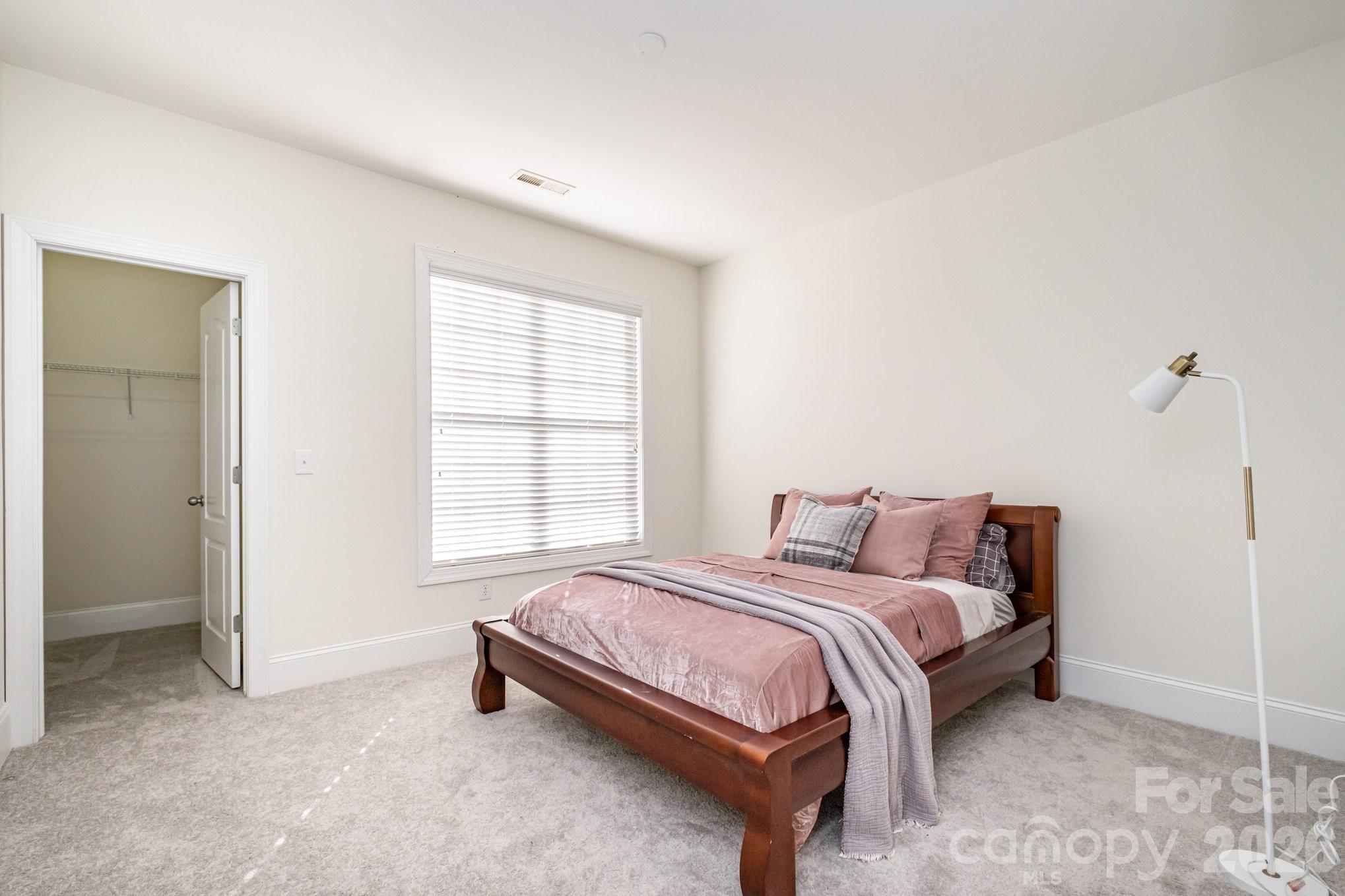 5019 Mesa Verde Road Charlotte, NC 28277 - Photo 26 of 40 a bedroom with a bed and a window