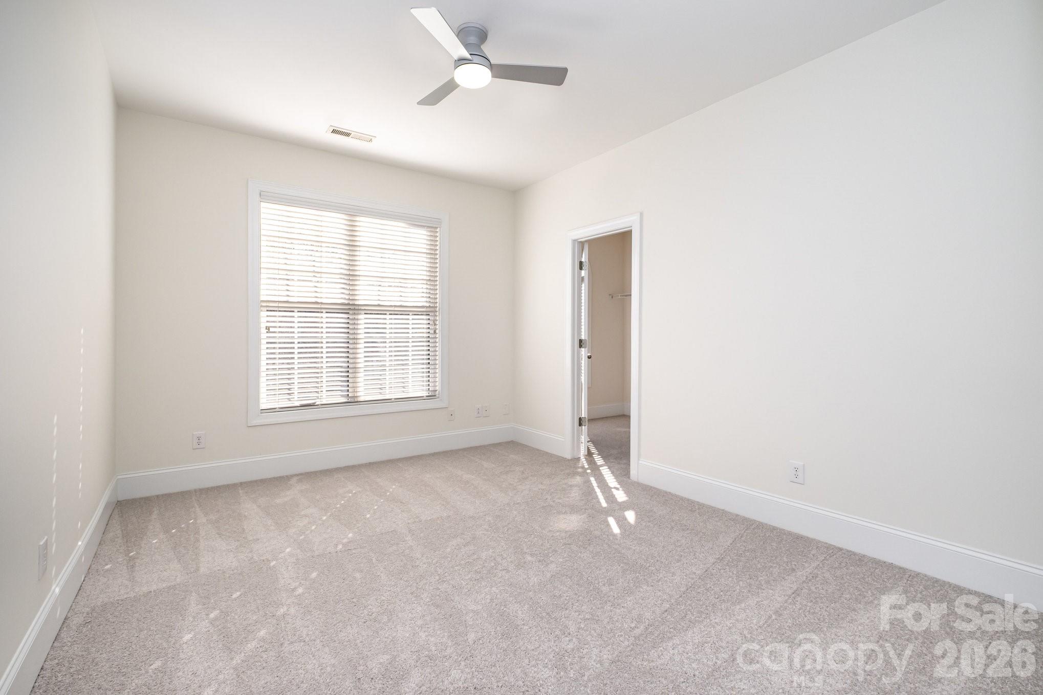 5019 Mesa Verde Road Charlotte, NC 28277 - Photo 28 of 40 wooden floor in an empty room with a window