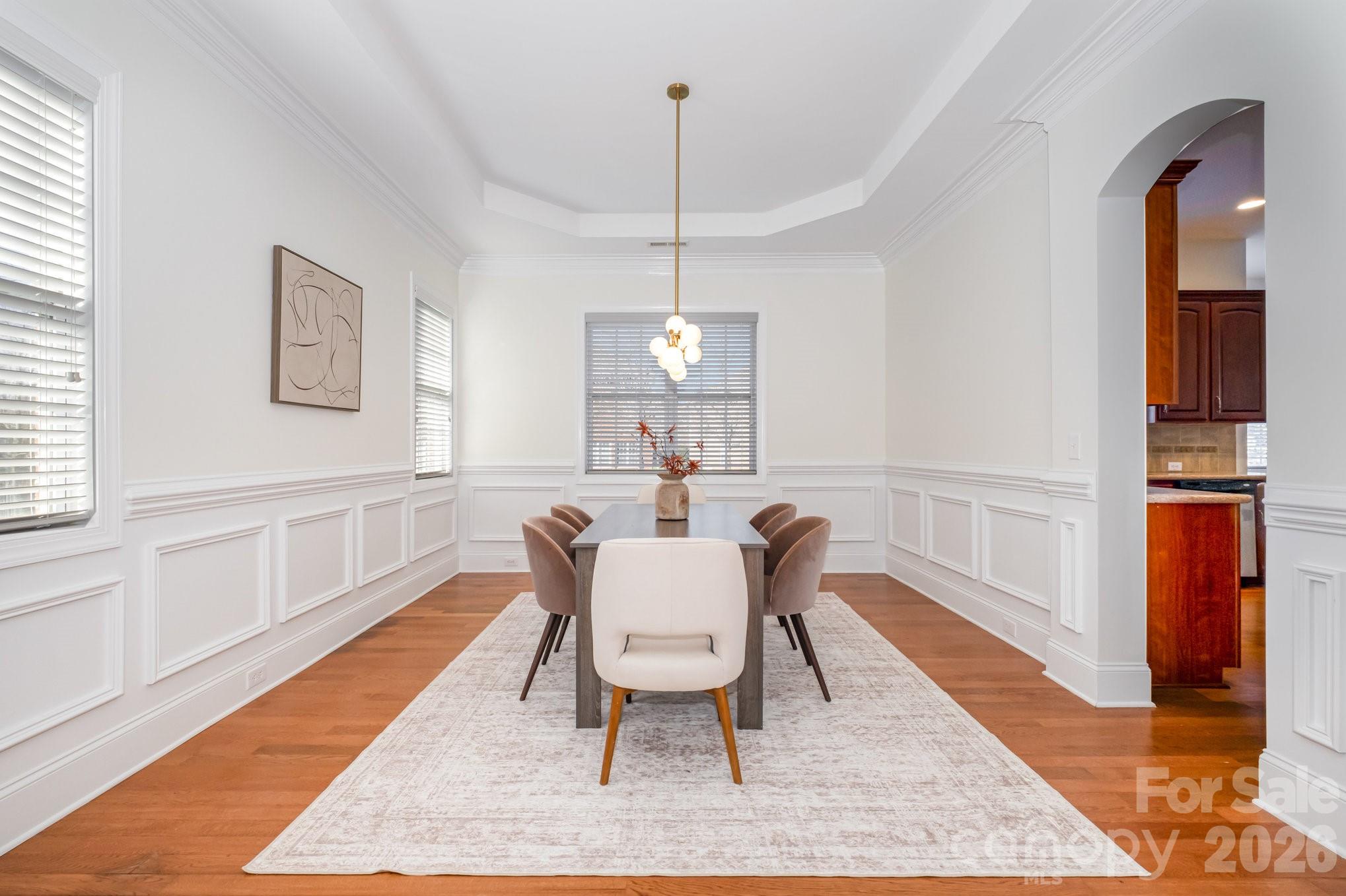 5019 Mesa Verde Road Charlotte, NC 28277 - Photo 6 of 40 a view of a dining room with furniture window and wooden floor