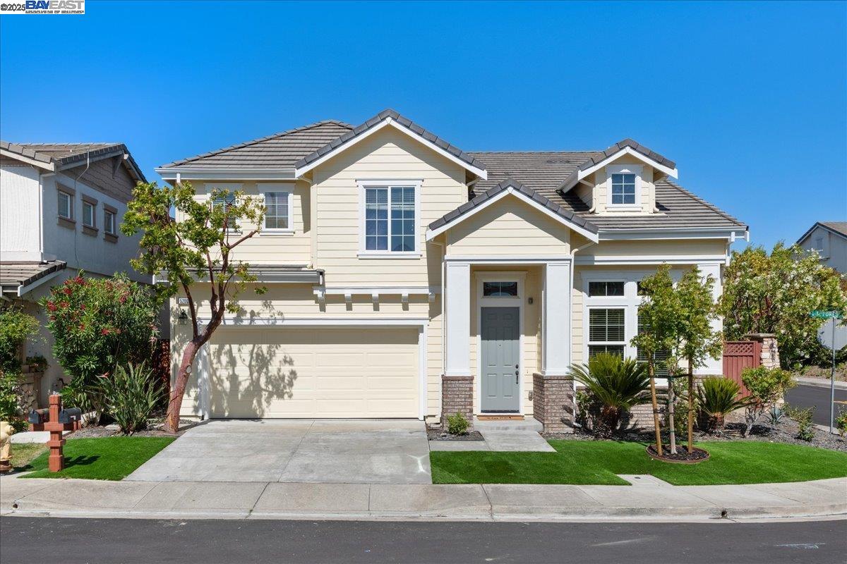 5200 North Forestdale Circle Dublin, CA 94568 - Photo 1 of 1 a front view of a house with a yard and garage