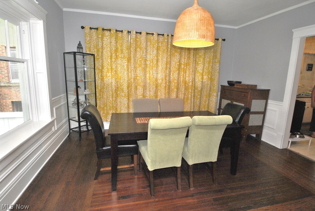 222 Merriman Road Akron, OH 44303 - Photo 4 of 17 The classic dining room has crown molding, chair rail and wainscoting.