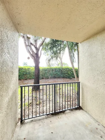 a view of a lake with houses in the back