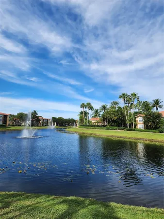 a view of a lake with a garden