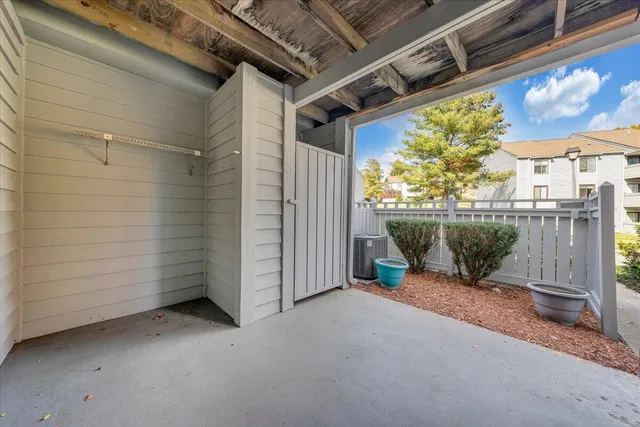 a view of a room with wooden walls