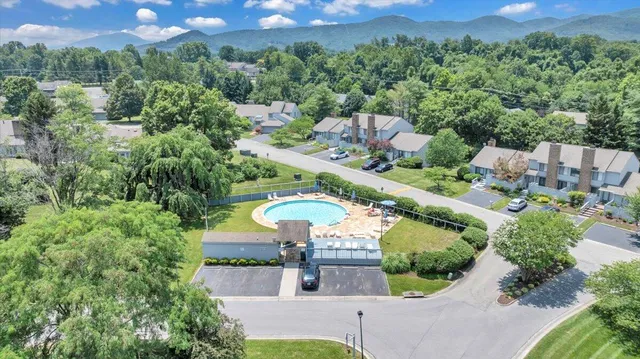 an aerial view of a house with a garden