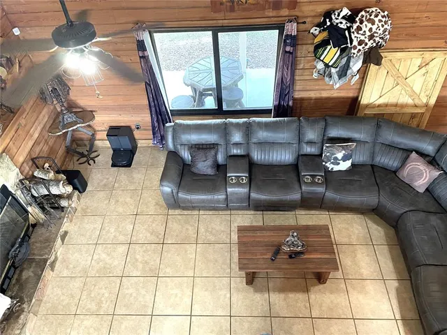 a view of a studio with many windows