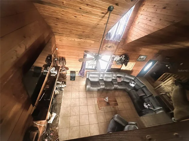 a view of a chairs and table in the patio