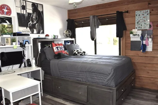 a room with water heater and a washer dryer