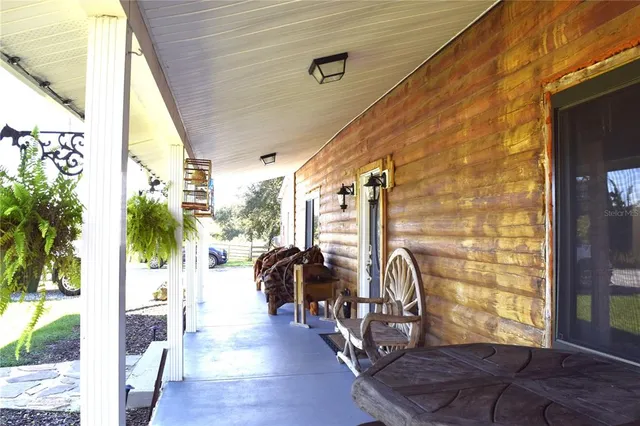 a view of a porch with furniture