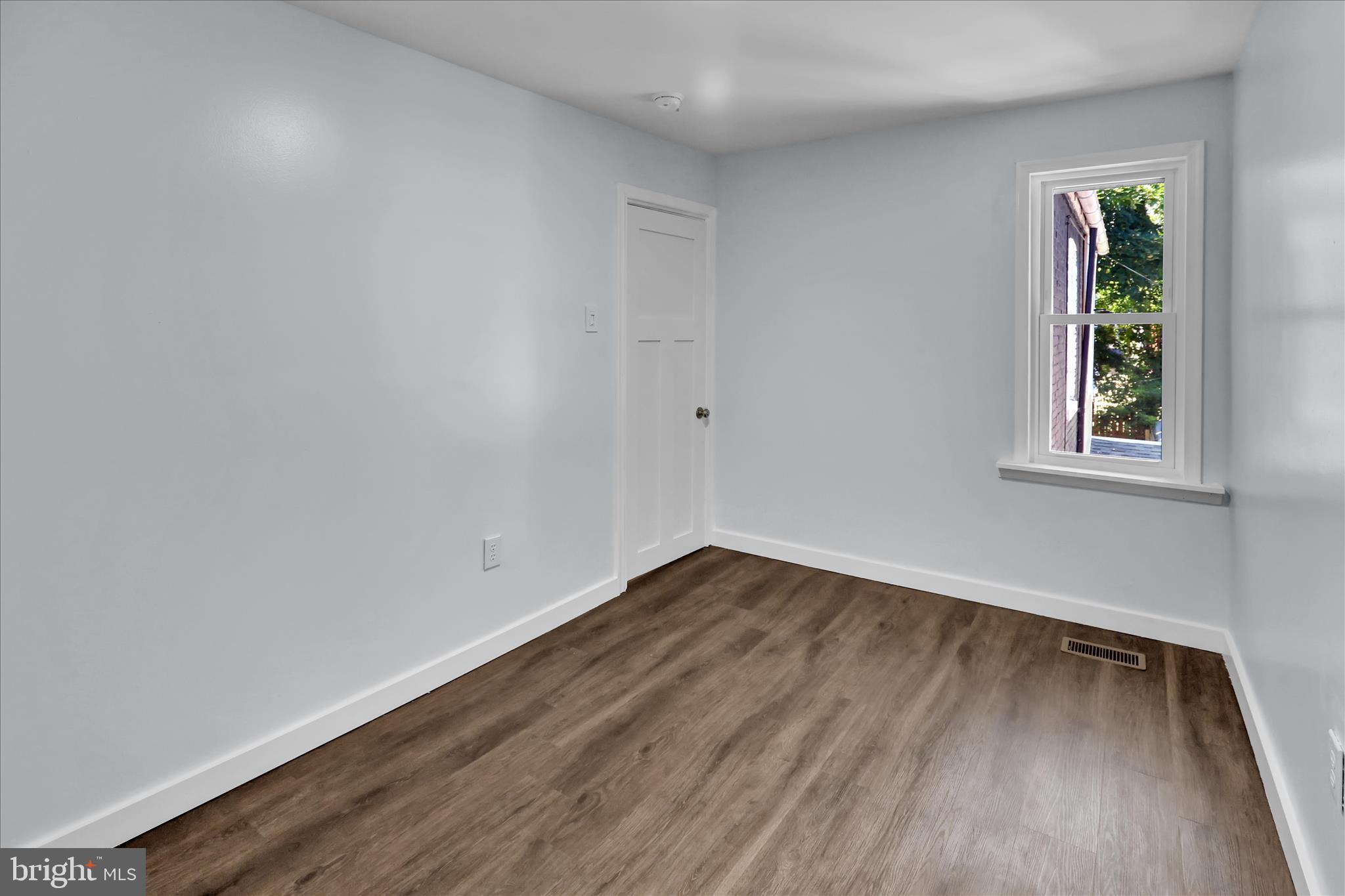 513 Manor Street Lancaster, PA 17603 - Photo 24 of 37 wooden floor in an empty room with a window