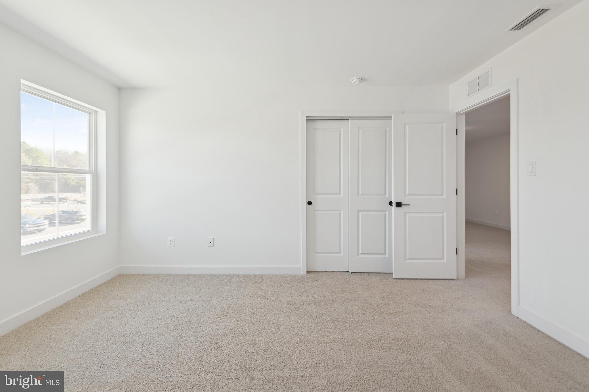 19711 Crows Nest Court Georgetown, DE 19947 - Photo 15 of 31 an empty room with window