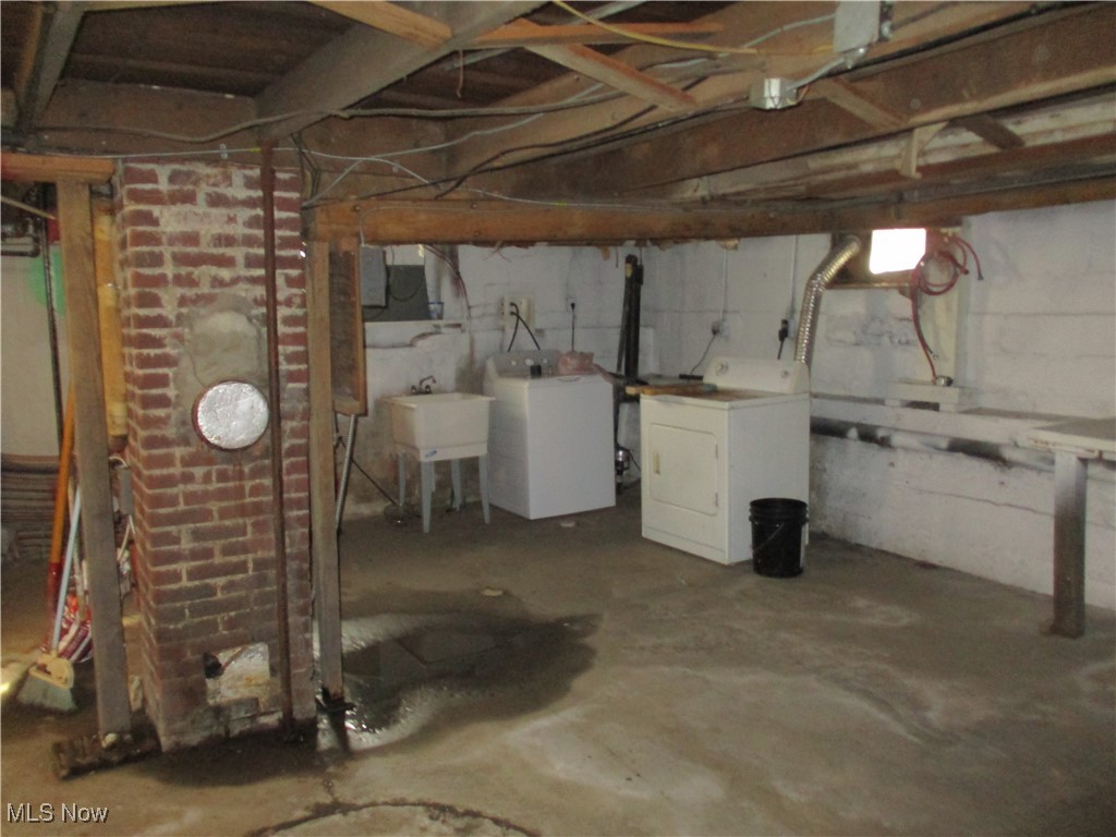 15401 A Madison Road Middlefield, OH 44062 - Photo 10 of 17 Basement with laundry tub
