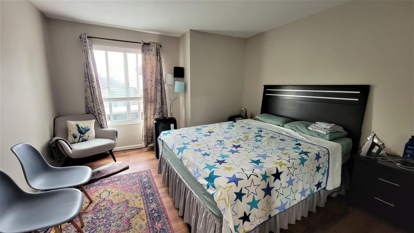 680 Dartmore Lane, Unit 259 Hayward, CA 94544 - Photo 24 of 25 a bedroom with a bed couch and a window