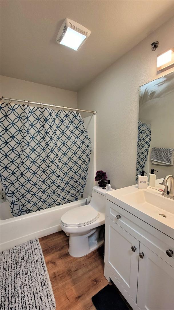 680 Dartmore Lane, Unit 259 Hayward, CA 94544 - Photo 25 of 25 a bathroom with a sink toilet and mirror