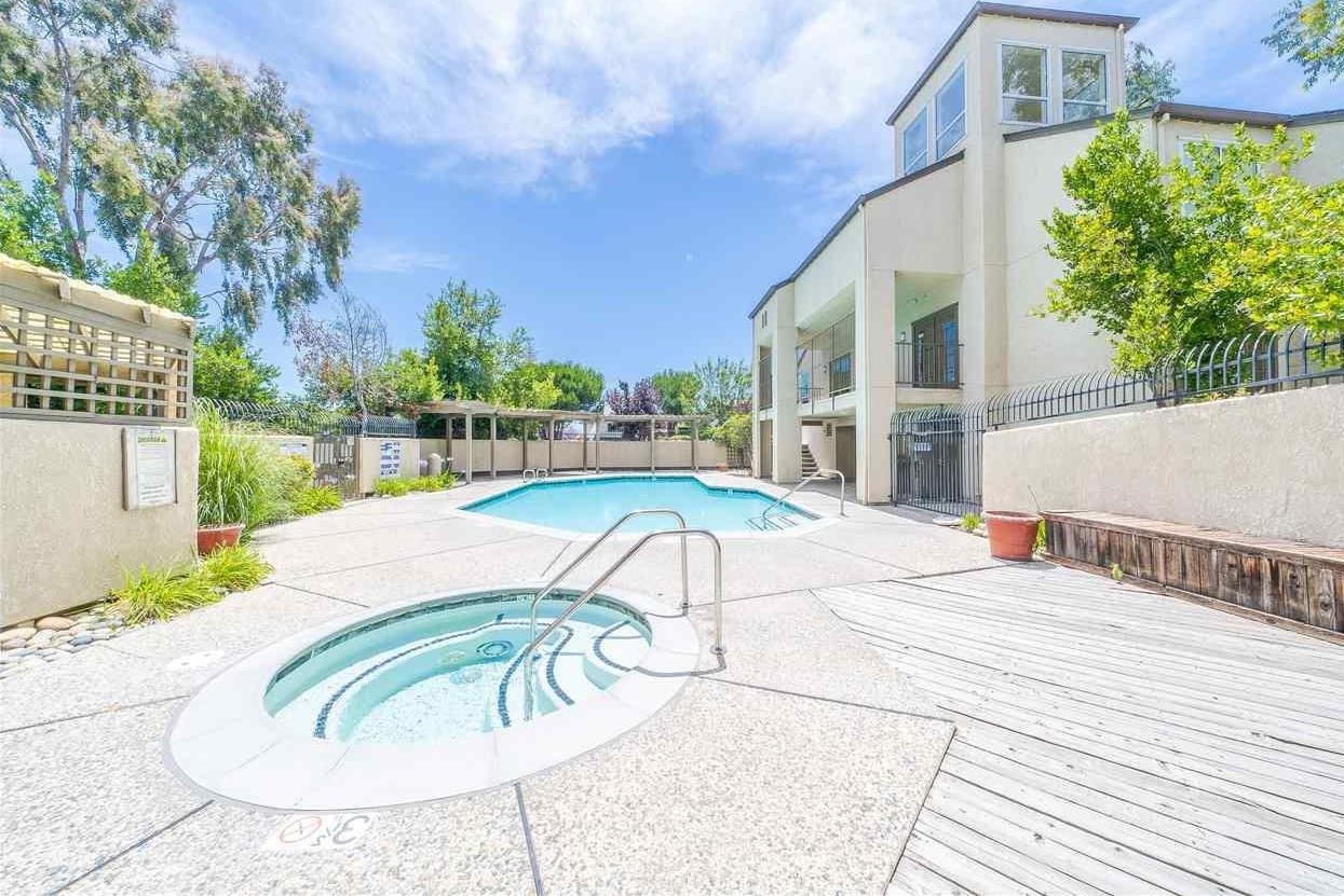 680 Dartmore Lane, Unit 259 Hayward, CA 94544 - Photo 6 of 25 a view of a swimming pool with a patio