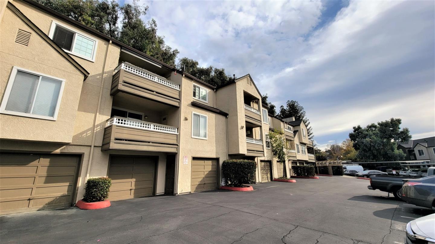 680 Dartmore Lane, Unit 259 Hayward, CA 94544 - Photo 10 of 25 a view of a car park in front of house