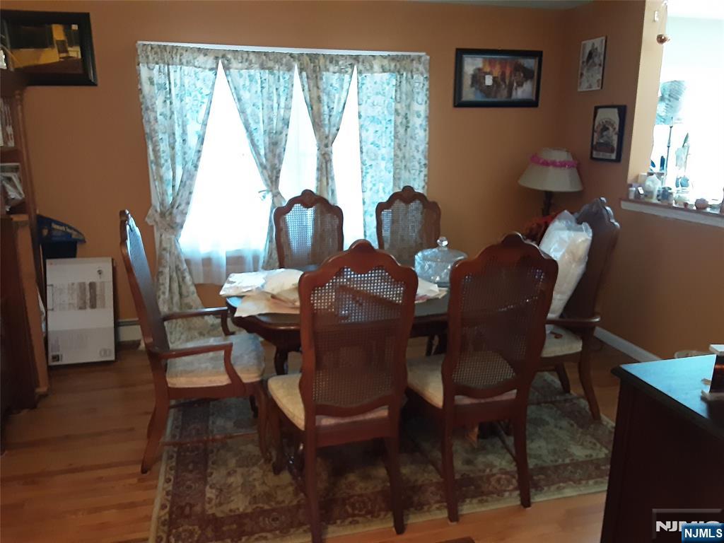 16 Crest Road Sussex, NJ 07461 - Photo 5 of 11 a view of a dining room with furniture and a window