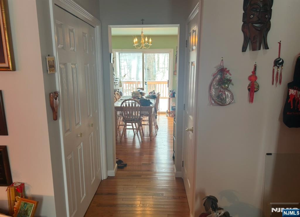 16 Crest Road Sussex, NJ 07461 - Photo 6 of 11 a hallway with wooden floor and furniture