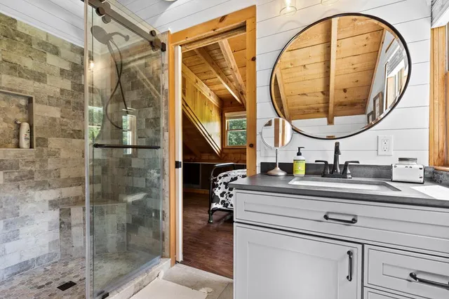 a kitchen with sink refrigerator and dining table