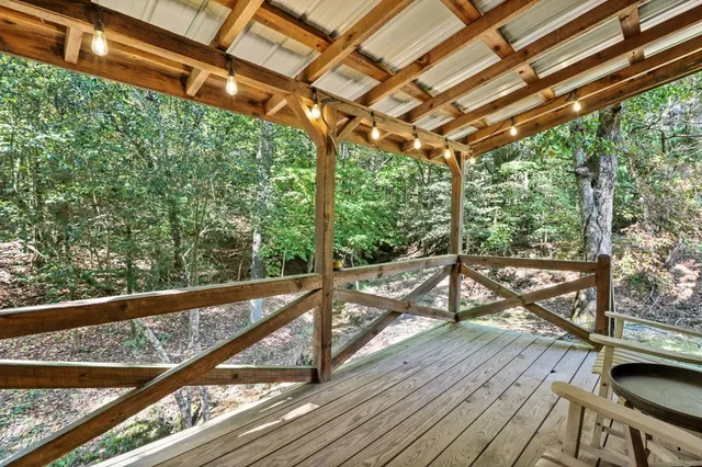 a view of a water pond with green space