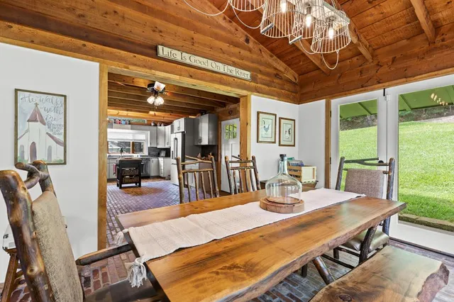 a bathroom with a toilet a sink and a mirror