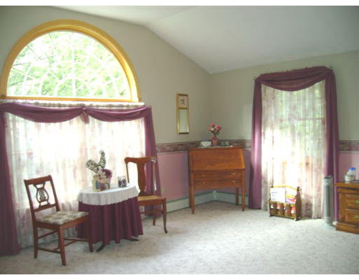 82 Wheeler Road Princeton, MA 01541 - Photo 13 of 25 a room with furniture and a large window