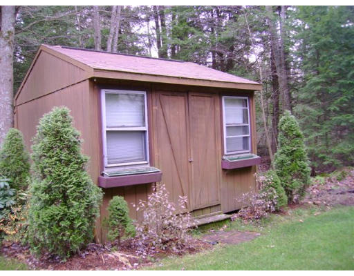 82 Wheeler Road Princeton, MA 01541 - Photo 23 of 25 a front view of a house with a garden