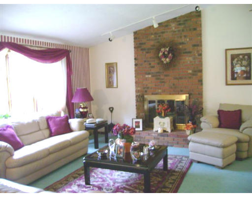 82 Wheeler Road Princeton, MA 01541 - Photo 5 of 25 a living room with furniture and a fireplace