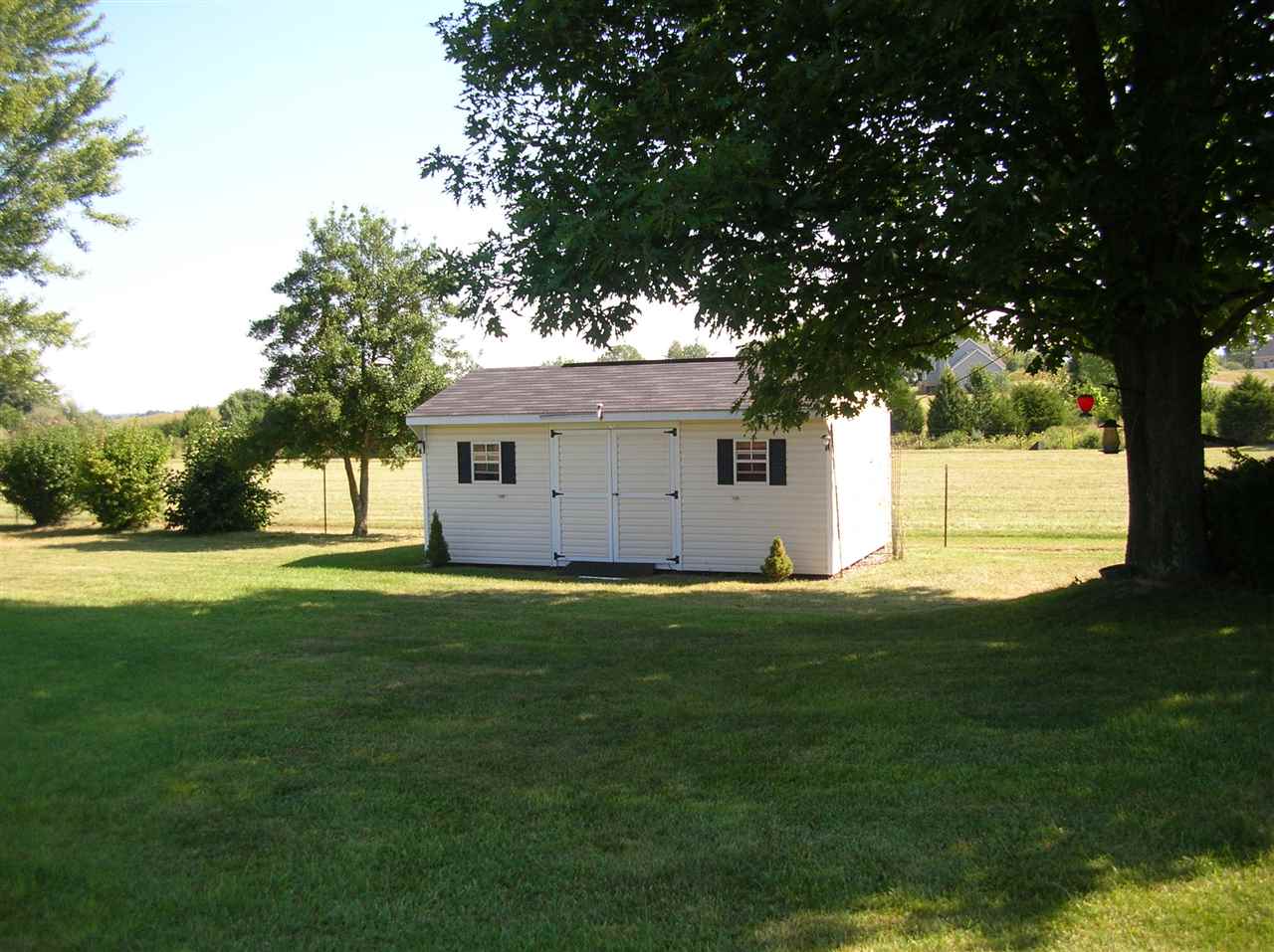 256 Kiddsville Road Fishersville, VA 22939 - Photo 4 of 13 a view of a house with a backyard