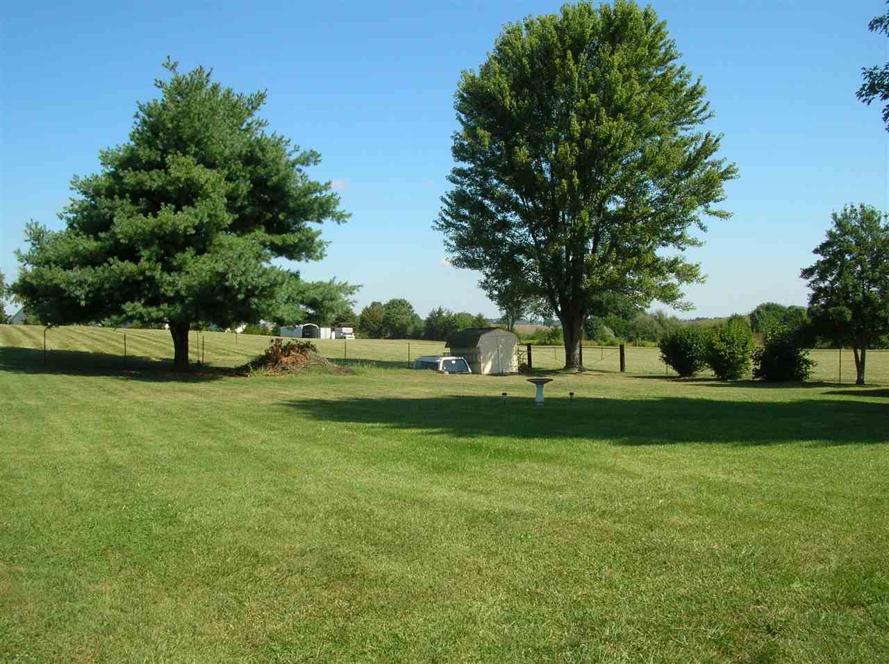 256 Kiddsville Road Fishersville, VA 22939 - Photo 5 of 13 a view of grassy field with benches and trees all around