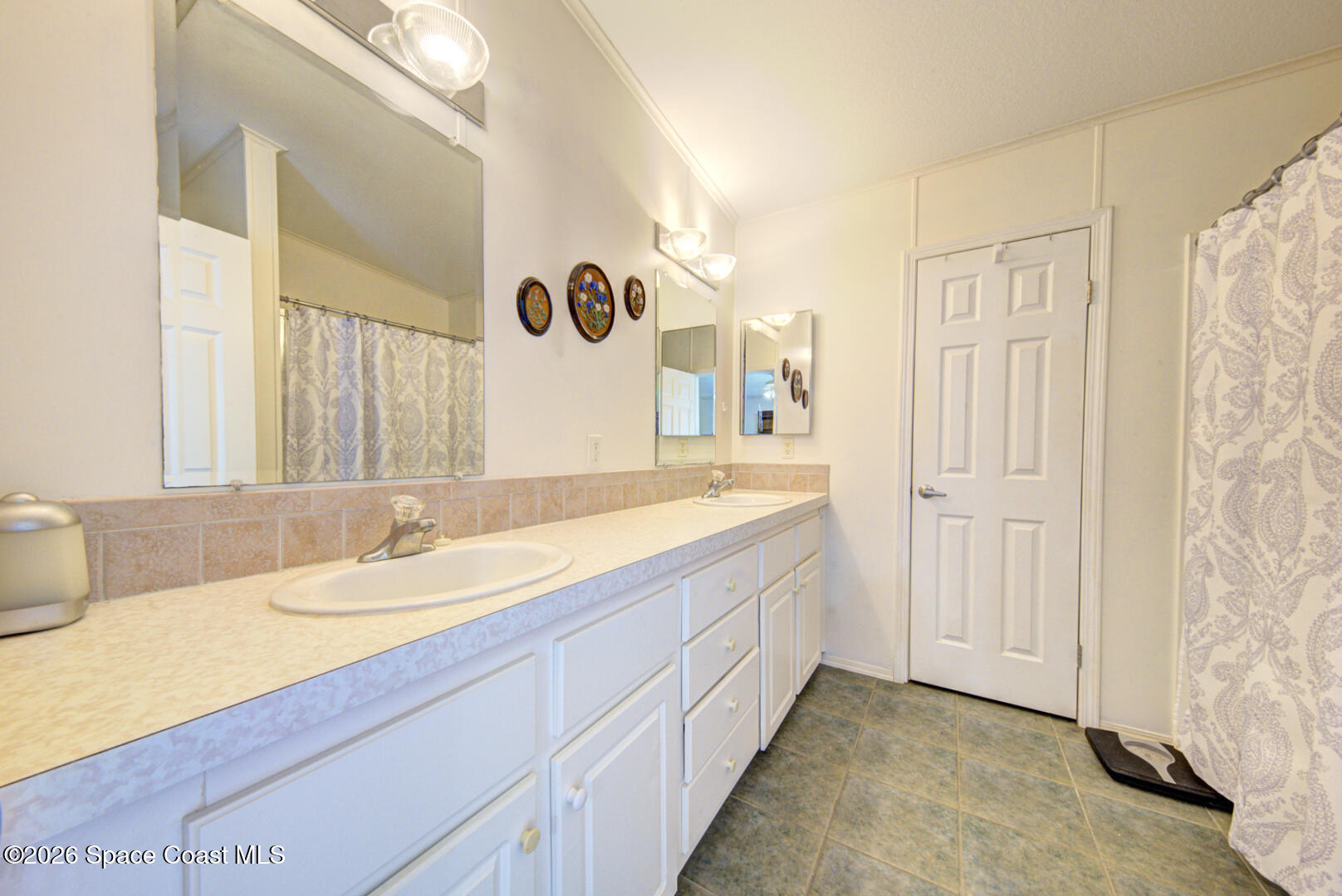 259 Timber Run Way Cocoa, FL 32926 - Photo 23 of 50 11 primary bathroom