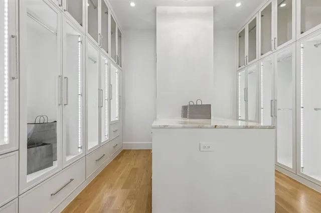 a bathroom with bathtub and shower