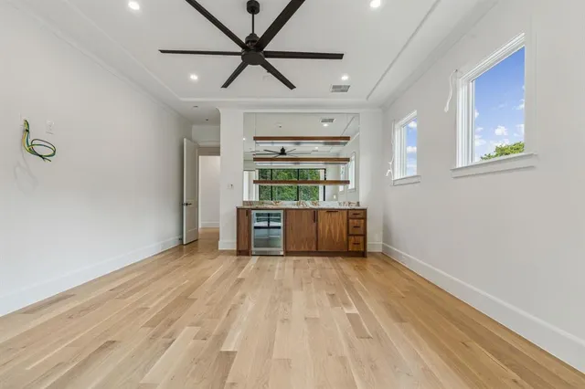 a view of a kitchen with a dishwasher and a window