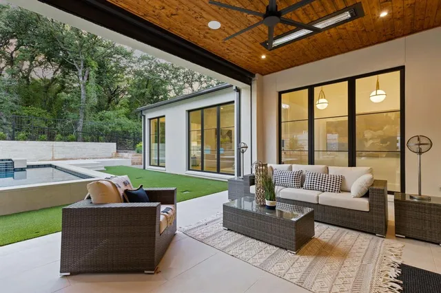 a outdoor living space with furniture and a couch