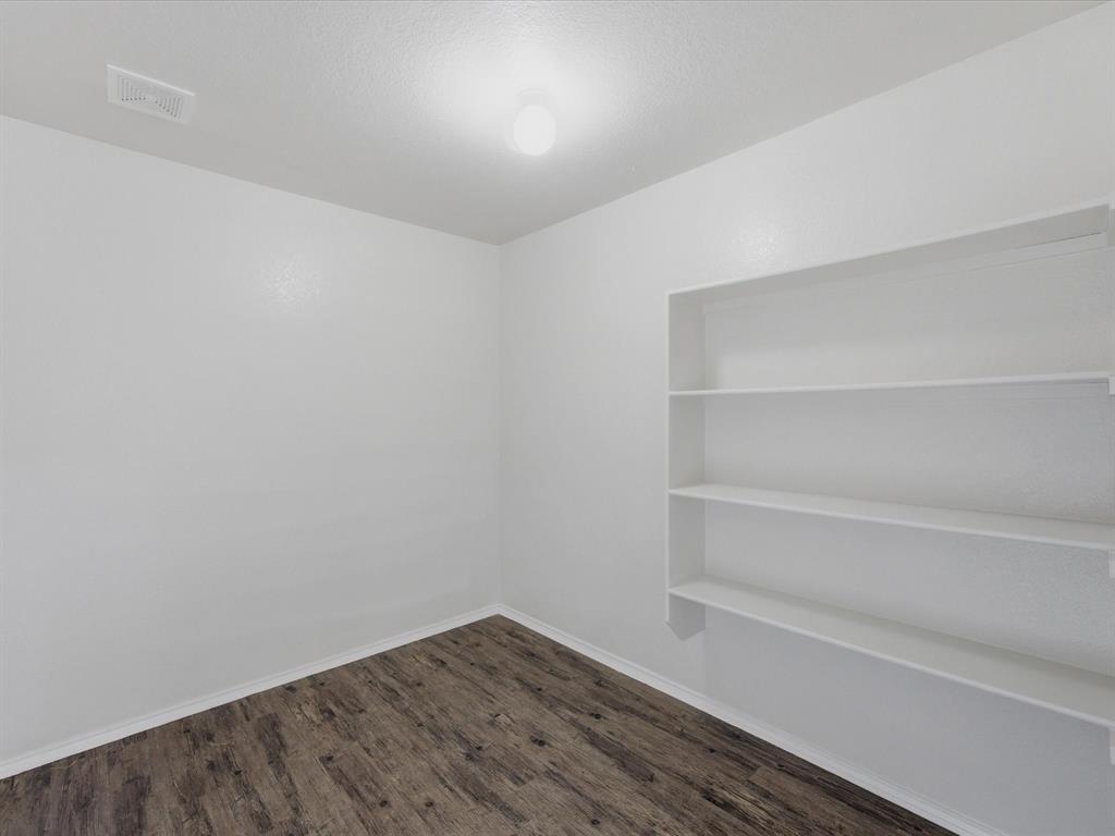 12134 Shine Avenue Rhome, TX 76078 - Photo 14 of 33 a view of an empty walk in closet