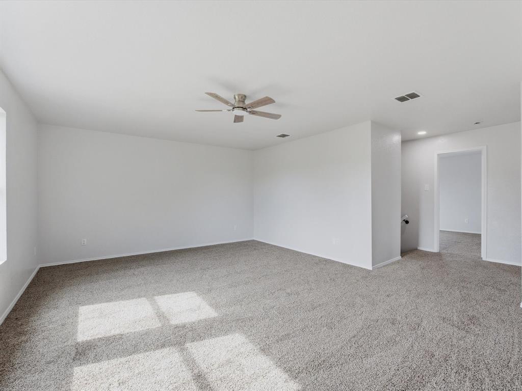 12134 Shine Avenue Rhome, TX 76078 - Photo 28 of 33 an empty room with a bathroom