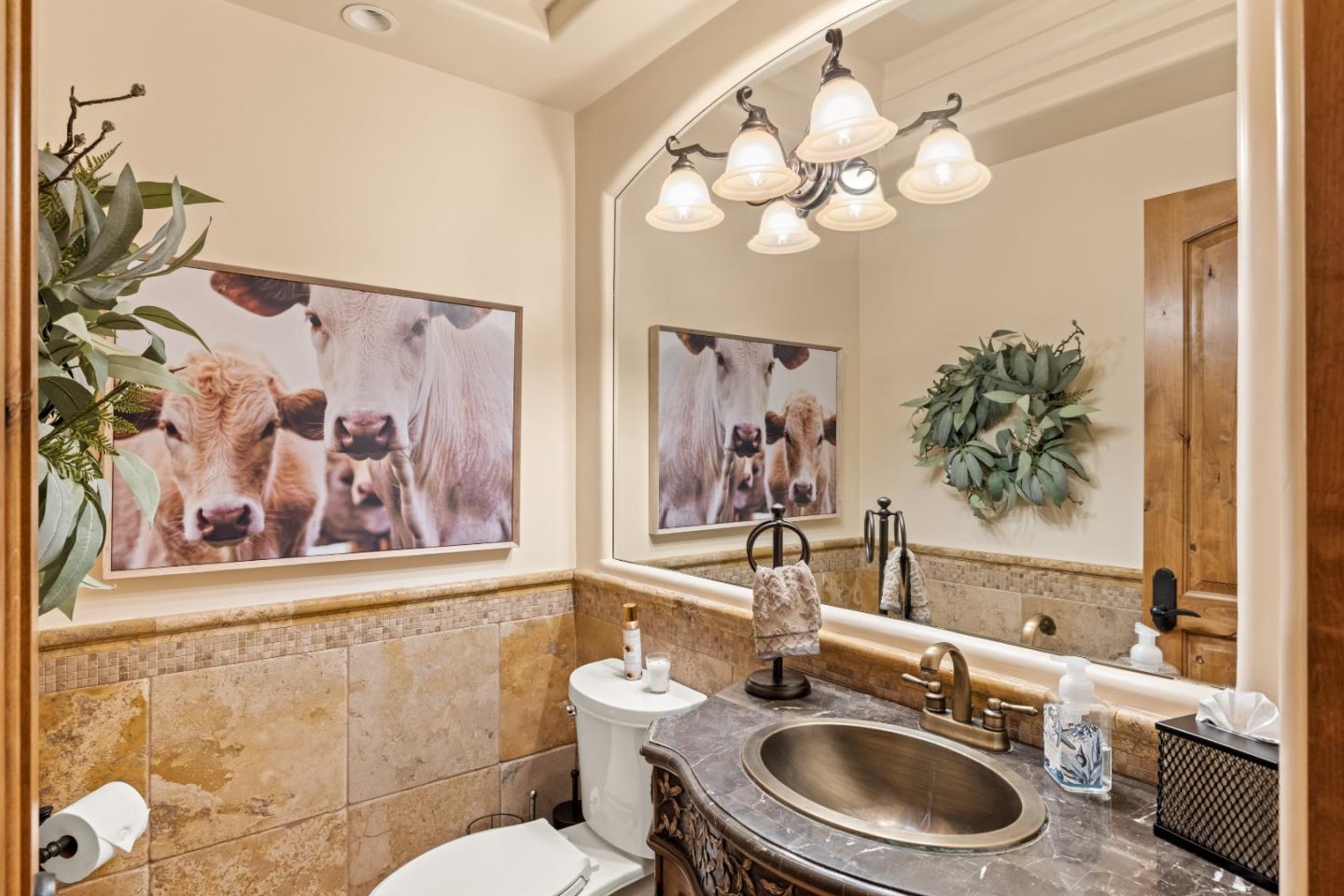 3116 Bird Rock Road Pebble Beach, CA 93953 - Photo 14 of 37 a bathroom with a sink a mirror and a toilet