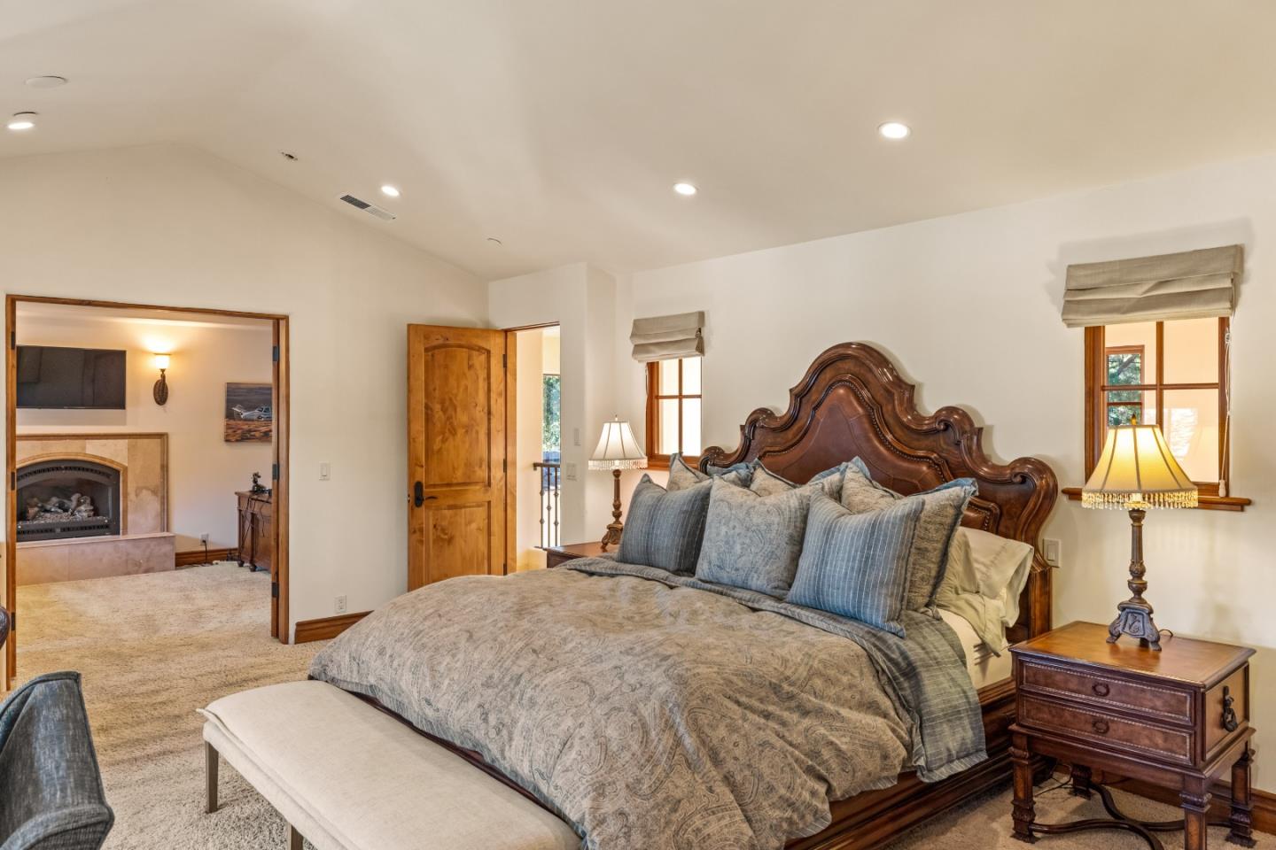 3116 Bird Rock Road Pebble Beach, CA 93953 - Photo 26 of 37 a bedroom with a bed and a couch